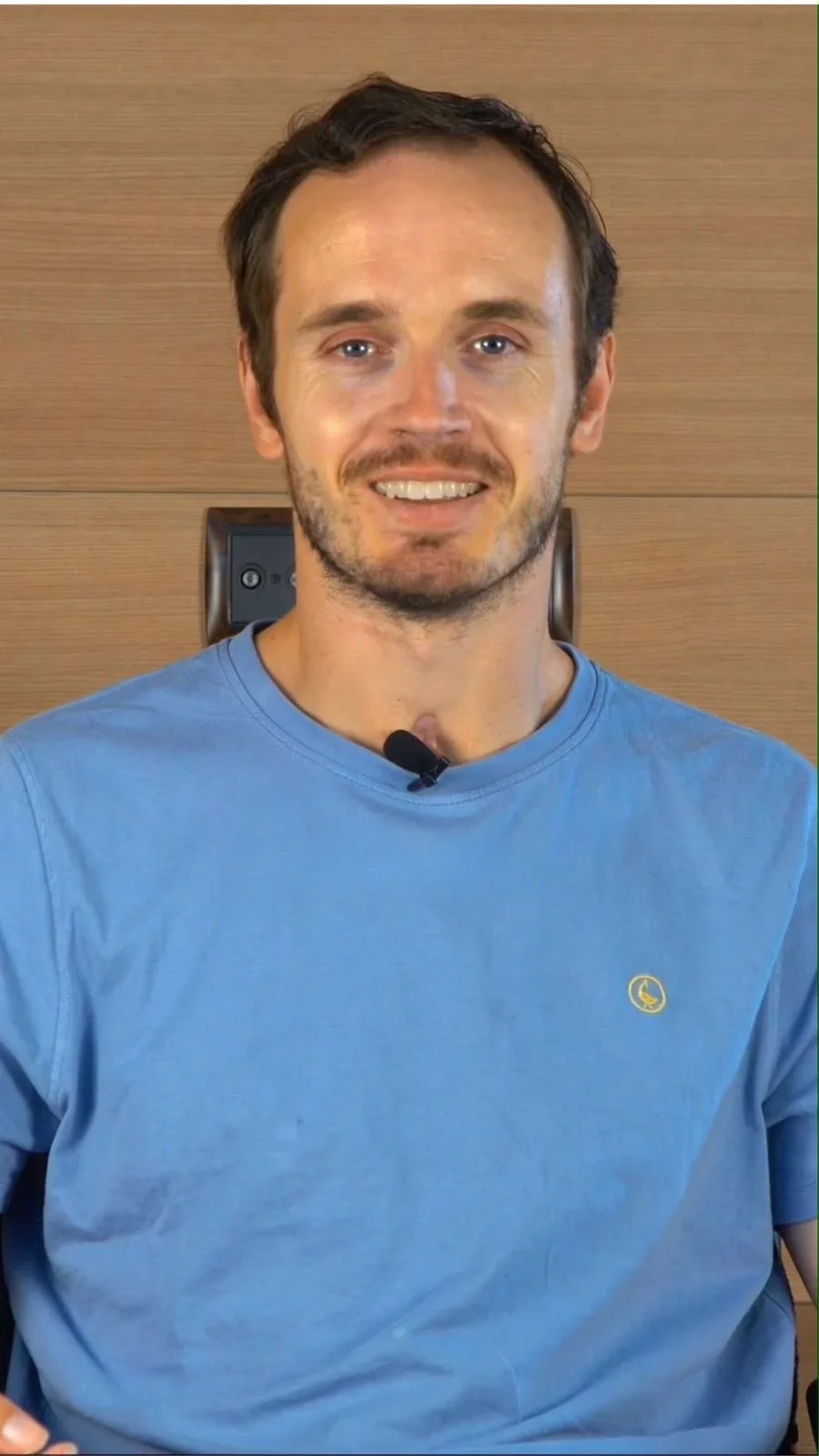 Guillermo Ucelay smiling, in a blue T-shirt
